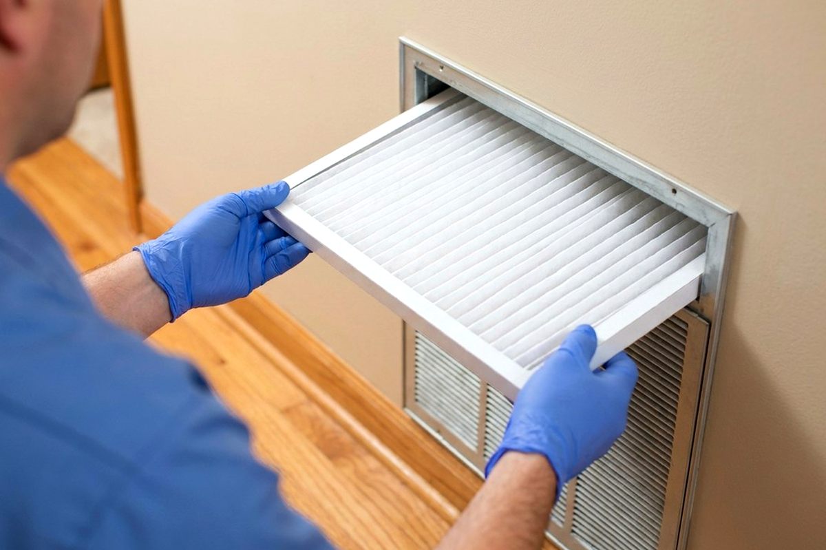 HVAC Maintenance technician at work